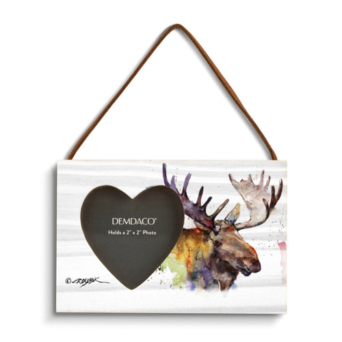 A rectangular wood hanging frame with a heart shaped 2 inch photo opening next to a watercolor image of a moose.