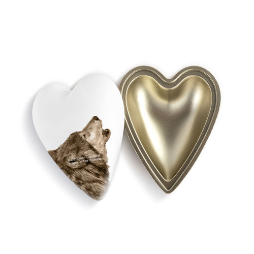 A heart shaped container with a wolf on a white background, shown with the lid offset to the base.
