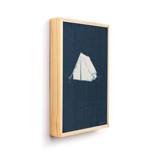 A graphic art image of a white tent on a dark blue background. The image is in a light wood frame and angled to the right.