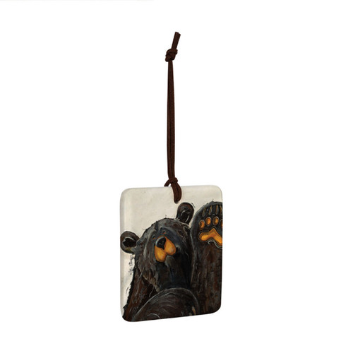 A square ceramic hanging ornament with a painting of a waving black bear, displayed angled to the right.