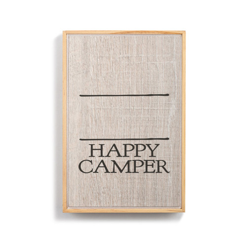 A light wood framed wall art that says "Happy Camper" on a wood grain background under two black lines for personalization.