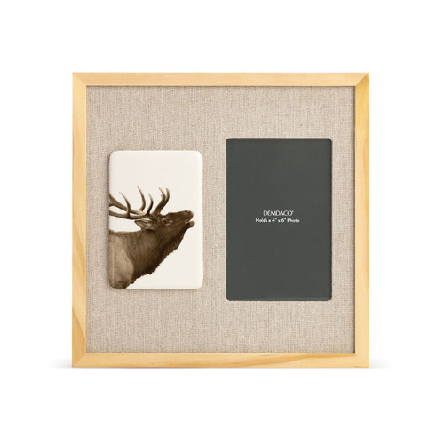 A light wood frame with a white tile on the left with the image of an elk next to a 4x6 photo opening with a linen mat.