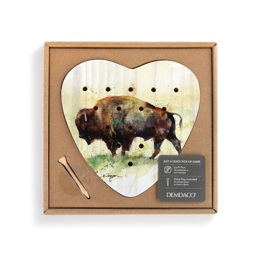A heart shaped wood peg game with a watercolor painting of a walking buffalo, displayed in a packaging box with a product information tag.