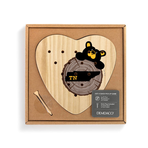 Heart shaped wood peg game with a black bear peeking over a wood stump with Tennessee on it, shown in a packaging box with a product information tag.