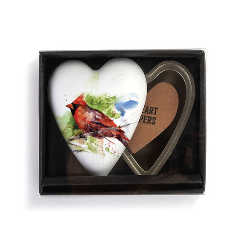 Heart shaped keeper with a watercolor image of a cardinal on the lid, displayed in a packaging box.