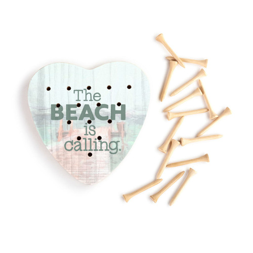 A heart shaped wood peg game with a lake pier scene that says "The Beach is calling", next to a set of wood pegs.