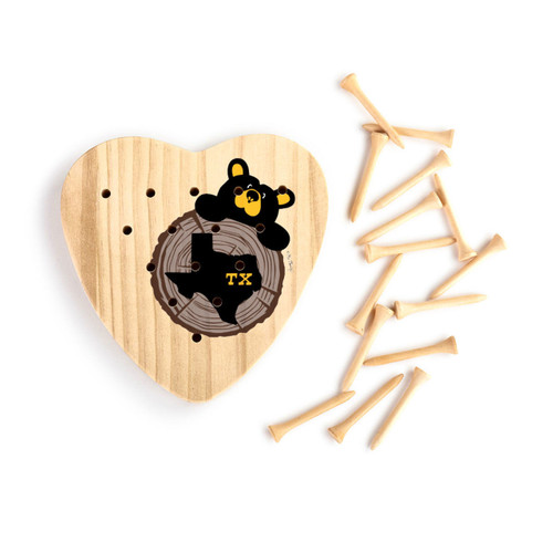 Heart shaped wood peg game with a black bear peeking over a wood stump with Texas on it, next to a set of wood pegs.