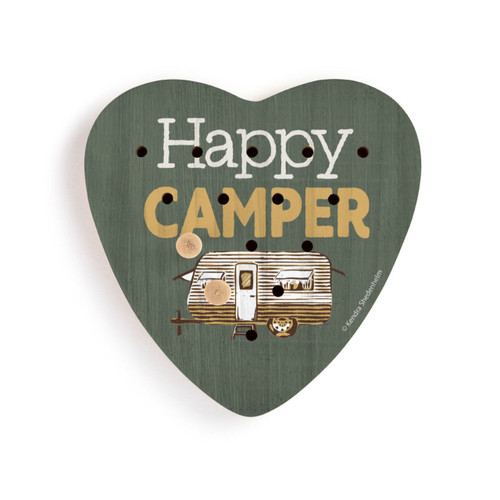 A dark green heart shaped peg game with a camper van and the saying "Happy Camper", shown with two wood pegs in the holes.