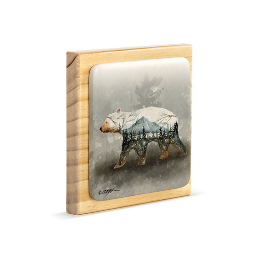 A square wood plaque angled to the right with a tile attached that has a watercolor image of a polar bear.