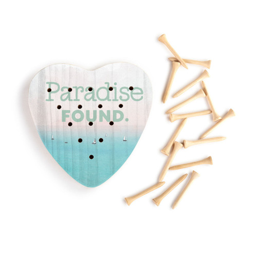 A heart shaped wood peg game with a lake scene that says "Paradise Found", next to a set of wood pegs.