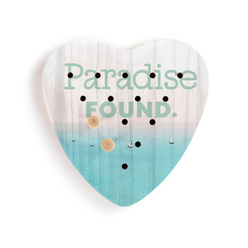 A heart shaped wood peg game with a lake scene that says "Paradise Found", displayed with two wood pegs in the game.