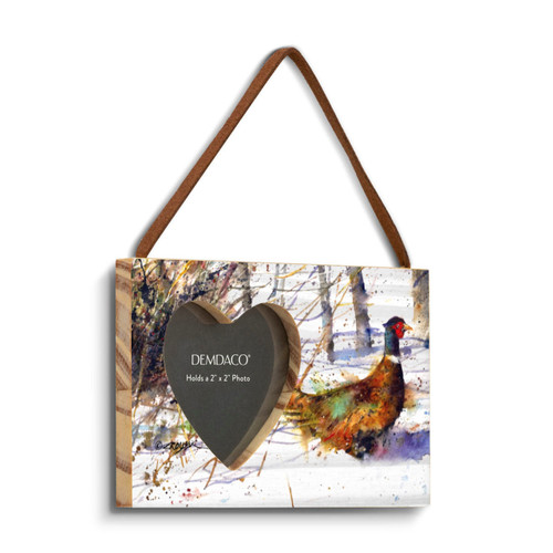 A rectangular wood hanging frame with a heart shaped 2 inch photo opening next to a watercolor image of a ringneck, displayed angled to the right.
