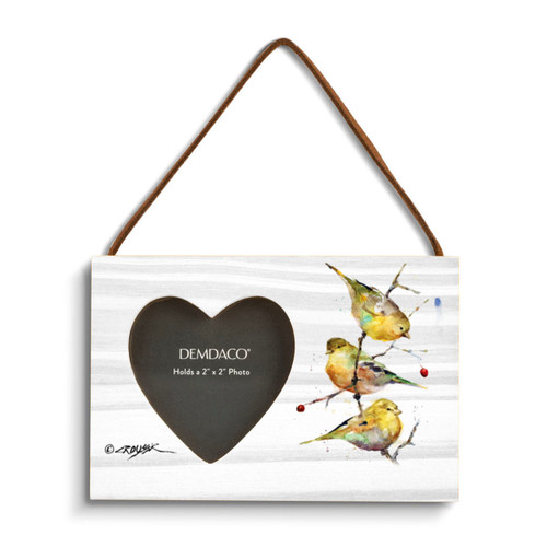 A rectangular wood hanging frame with a heart shaped 2 inch photo opening next to a watercolor image of three gold songbirds.