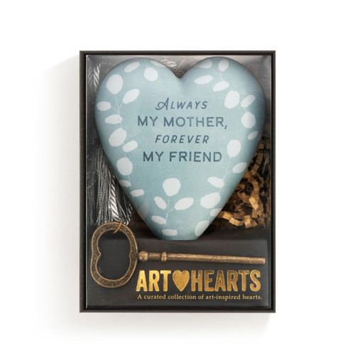 Heart shaped sculpture with a silver tassel and metal key attached. The heart is light green with white leaves and says "Always My Mother, Forever My Friend", displayed in a packaging box.