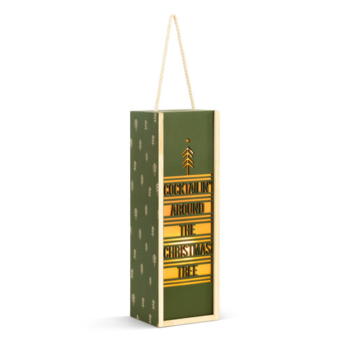 Tall rectangular pine wood lantern in dark green with a cutout on the front that says "Cocktailin' Around the Christmas Tree". The lantern has a rope handle, displayed angled to the right.