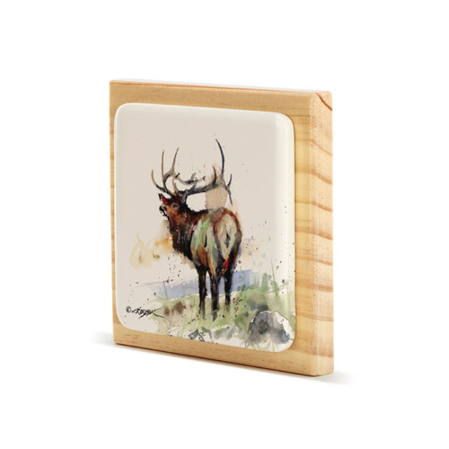 A square wood plaque angled to the left with a tile attached that has a watercolor image of an elk.