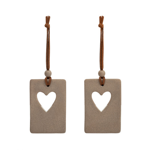 Back view of a set of two hanging tan and white ceramic ornaments with a heart cutout and metal tokens that say "angel". One ornament says "guide us and keep us safe" and the other says "protect and watch over us".