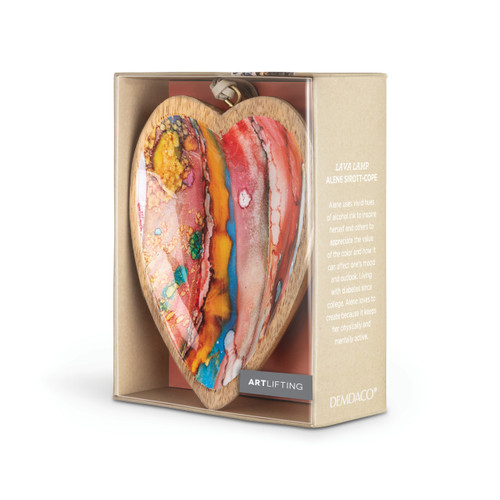 Side packaging view telling the artist story for a hanging heart shaped wood ornament with a vertical orange and red artwork inside inspired by ArtLifting artist Alene Sirott-Cope.