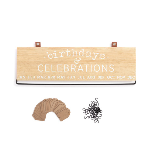A rectangular hanging wood calendar with a metal bar to hang tags and reminders for birthdays and celebrations under the months of the year.
