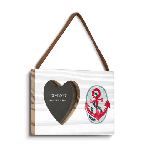 A rectangular hanging white wood frame ornament with a graphic image of a red anchor and a 2x2 heart shaped opening for a photo, displayed angled to the right.