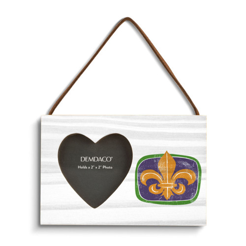 A rectangular hanging white wood frame ornament with an orange and dark blue fleur-de-lis with a 2x2 heart shaped opening for a photo.