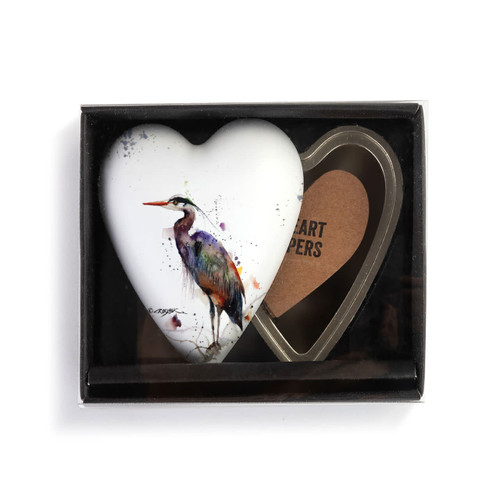 Heart shaped keeper with a watercolor image of a heron on the lid, displayed in a packaging box.