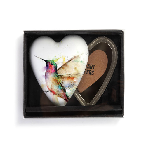Heart shaped keeper with a watercolor image of a hummingbird on the lid, displayed in a packaging box.