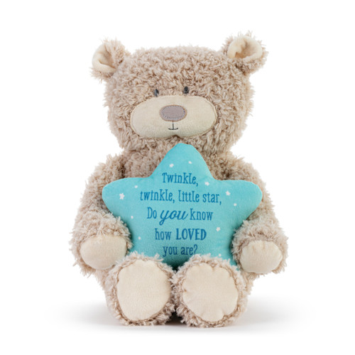 A brown plush musical bear holding a blue star that says "Twinkle, twinkle, little star, Do you know how Loved you are?".