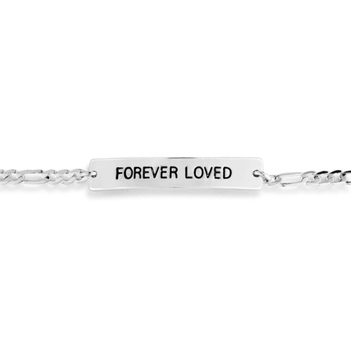 Detail view of the silver metal bar charm on an adjustable silver chain bracelet with a metal bar that says "Forever Loved".