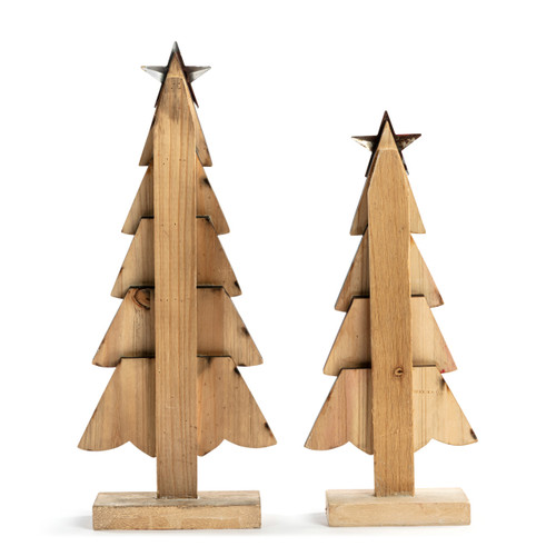 Back view of two wood decorative trees with layered wood pieces with different designs and red and white colors. Each tree has a red star at the top.