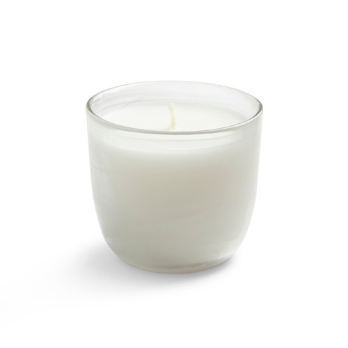 A small white candle in a clear glass container displayed on a white background.