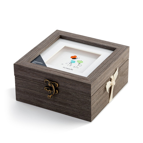 A square gray wood keepsake box with a metal clasp. The top has pebble art of flowers and a butterfly and says "friends grow together", displayed angled to the left with a product tag and ribbon.