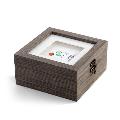 A square gray wood keepsake box with a metal clasp. The top has pebble art of flowers and a butterfly and says "friends grow together", displayed angled to the right.