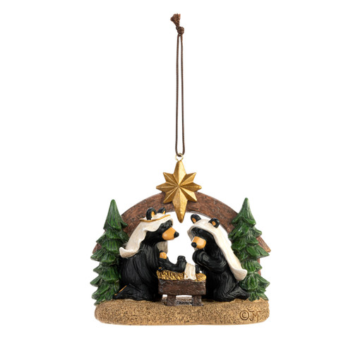 A hanging Christmas ornament of a nativity scene with black bears as the figures.