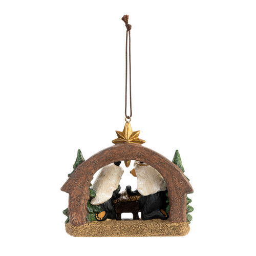 Back view of a hanging Christmas ornament of a nativity scene with black bears as the figures.