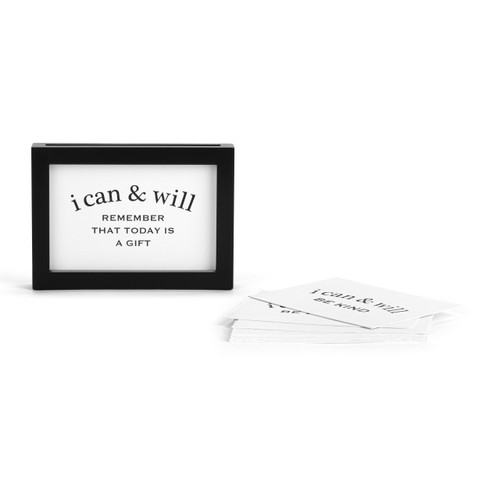 A black rectangular frame with an opening in the top to insert different "i can & will" encouraging statement cards.