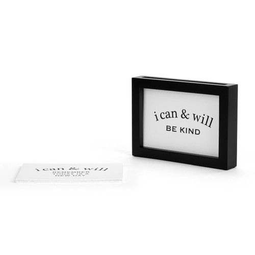 A black rectangular frame with an opening in the top to insert different "i can & will" encouraging statement cards, displayed angled to the left.