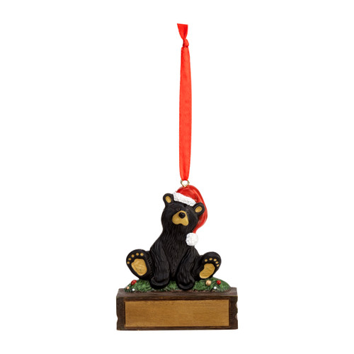 A hanging ornament that has a black bear in a Santa hat on a rectangular base that can be personalized.