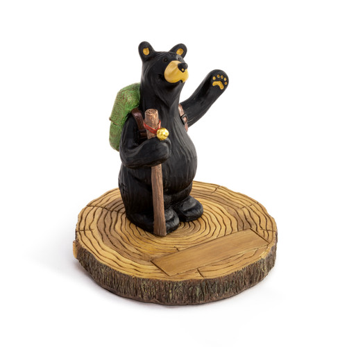 A sculpted figure of a black bear wearing a backpack and carrying a hiking stick. The base has a rectangular space for personalization, displayed angled to the right.