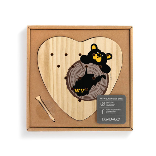 A wood heart shaped peg game with a black bear peeking over a wood stump with West Virginia on it, displayed in a packaging box.