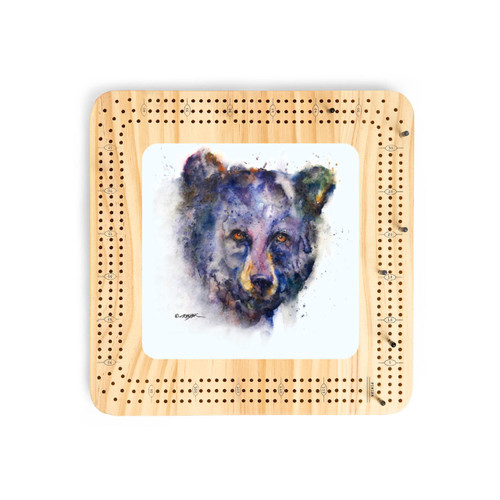 A light wood cribbage board with a watercolor image of a bear's face in the middle.