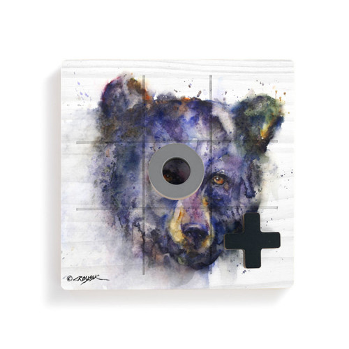 A square white wood board for tic tac toe with a watercolor image of a determined bear's face, displayed with a gray O and black X on top.