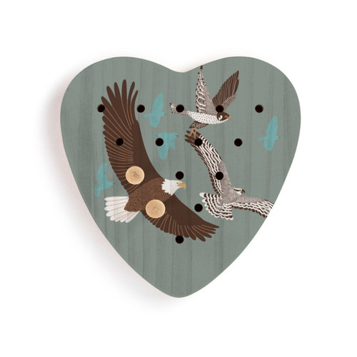 A dark green wood heart shaped peg game with an illustration of different birds in flight, displayed with two wood pegs in the game.