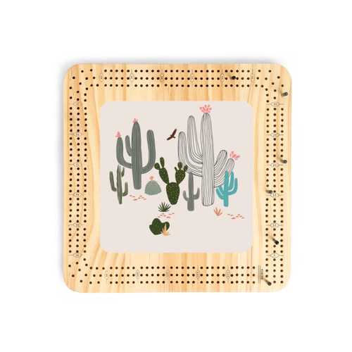 A light wood cribbage board with an illustration of different cacti.