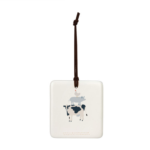 A square cream hanging tile magnet ornament with an illustration of a cow, pig and chicken.