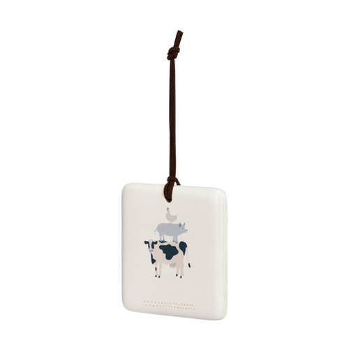 A square cream hanging tile magnet ornament with an illustration of a cow, pig and chicken, displayed angled to the left.