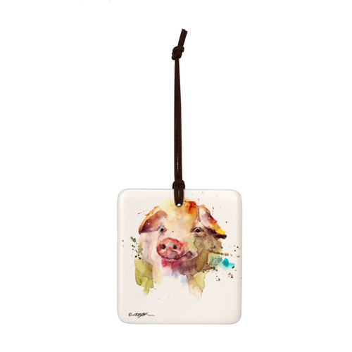 A square cream hanging tile magnet ornament with a watercolor image of a pig's face.