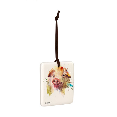 A square cream hanging tile magnet ornament with a watercolor image of a pig's face, displayed angled to the right.