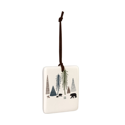 A square cream hanging tile magnet ornament with an illustration of bears in a forest, displayed angled to the right.