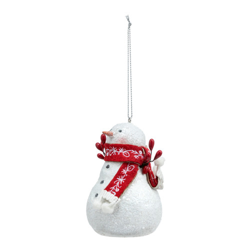A white snowman ornament with red berry branch arms and a red scarf, displayed angled to the left.